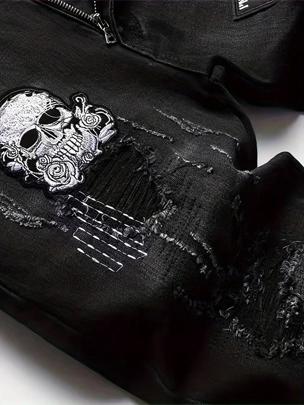 Vaqueros de patchwork con calaveras para hombreVaqueros de patchwork con calaveras para hombre